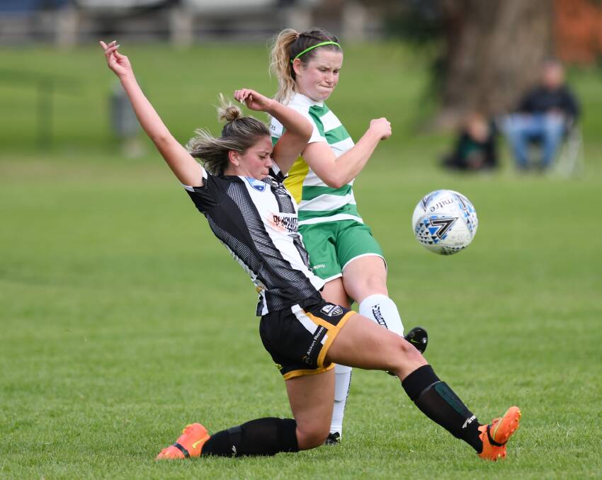 CHASING A WIN: Wagga City Wanderer Manessah Humphries competes with Tuggeranong United's Rhiannon Daisley in their only win earlier this year. 