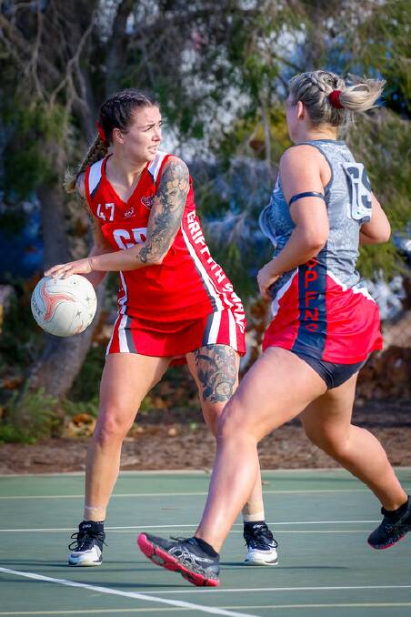 UPSET: Griffith's Louise Robertson looks for a passing option on Saturday. Picture: Andrew McLean Photography. 