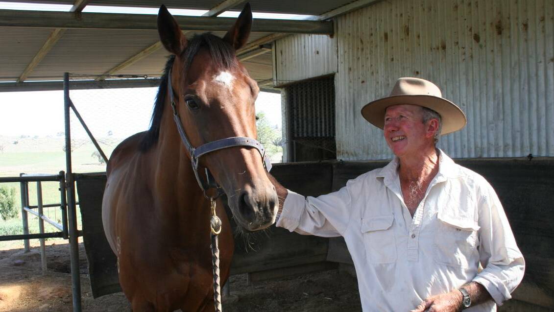 LUCKY RUN: Wantabadgery trainer Rodger Waters with Exchancellor, who won the Tumbarumba Cup in 2016. Picture: Declan Rurenga. 