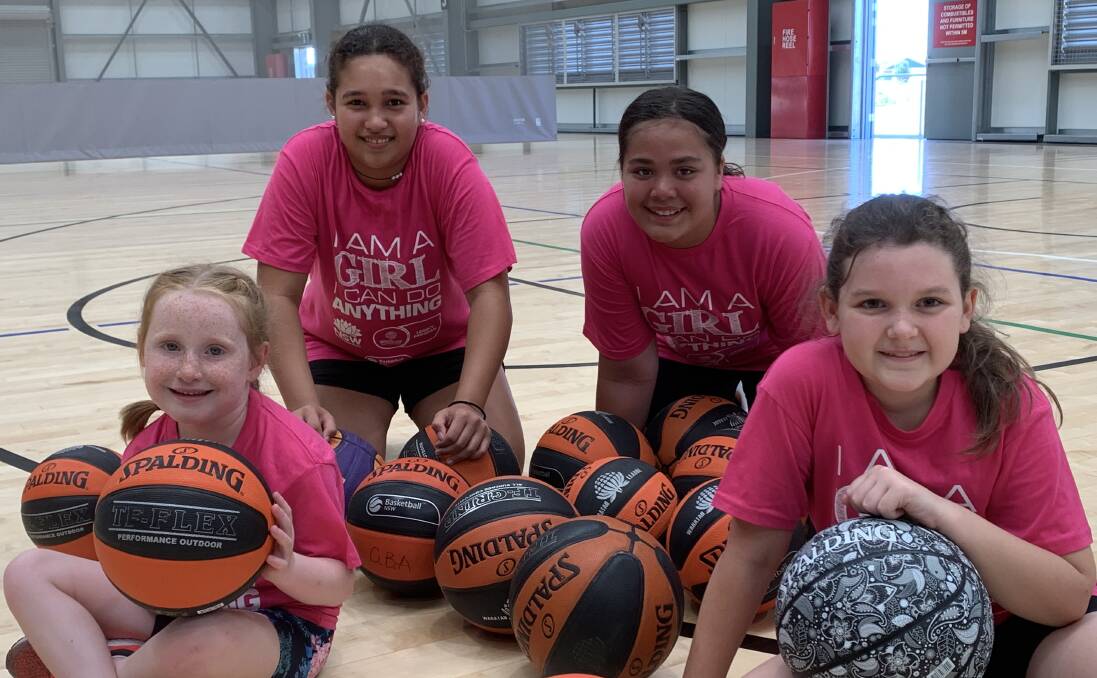 HAVING A GO: Junior girls hit the Equex Centre courts for a Basketball NSW clinic on Monday. Back (from left) Latoya Nelson-George, 14 and Atereana Kahukura, 11. Front (from left) Frankie Townsend, five and Ruby Dwyer, nine. Picture: Jon Tuxworth