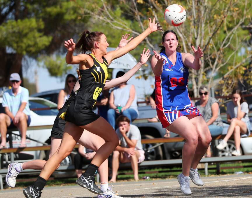 EASTER BATTLE: Wagga Tigers captain Jess Allen (left) battles for the ball with Turvey Park's Claire Doyle during their Good Friday clash. Picture: Emma Hillier.