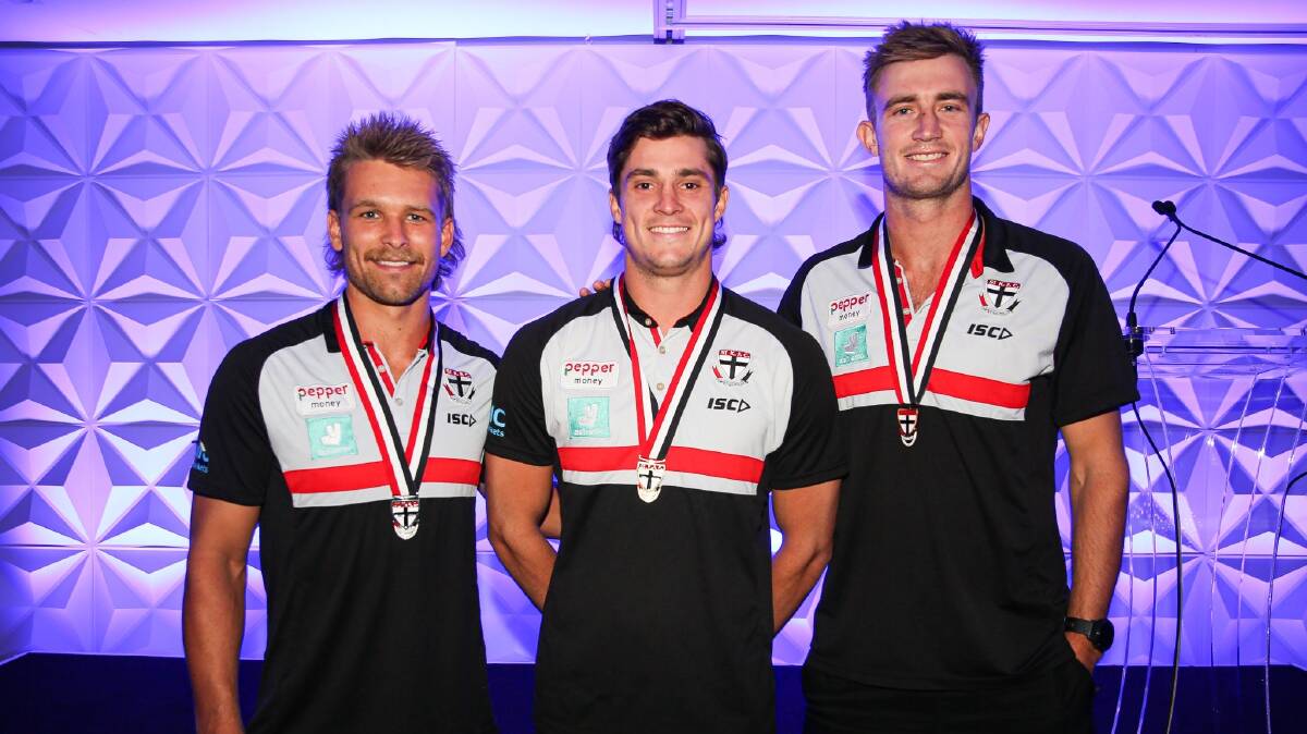 STANDOUTS: Dougal Howard (right) with Dan Butler and Jack Steele at St Kilda's Trevor Barker Award night on Sunday. Picture: St Kilda FC