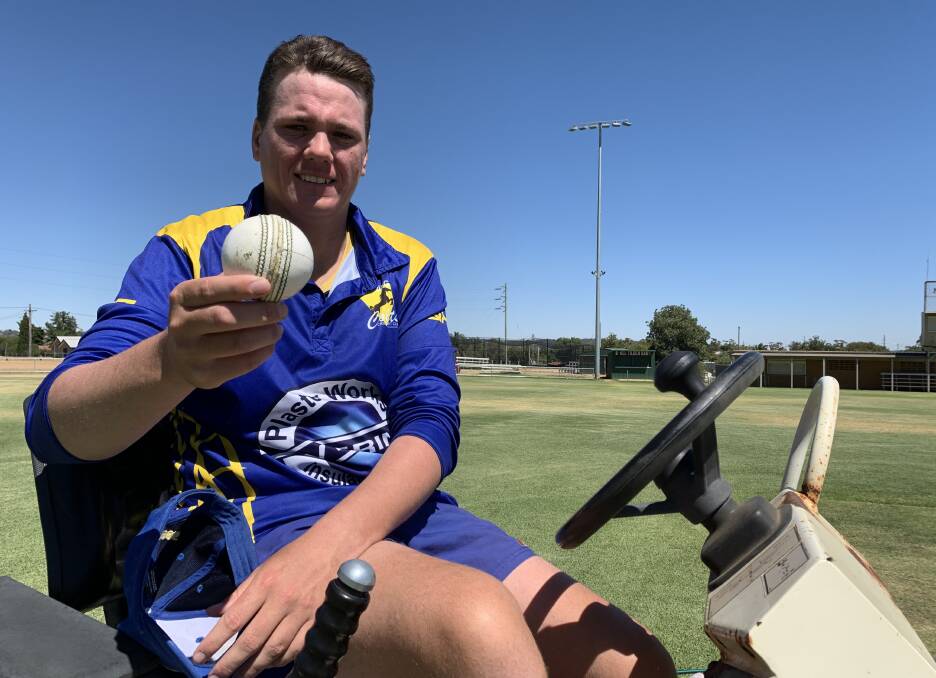 MILESTONE MAN: Koorginal Colt Macgregor Hanigan with the ball he took 8-14 with against Lake Albert while curating at Harris Park on Tuesday. Picture: Jon Tuxworth