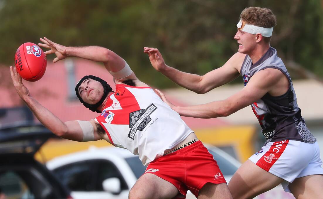 BIG GRAB: Griffith's Reece Matheson takes a mark in an AFL Riverina clash with Collingullie-Glenfield Park last year. Senior sport can return from next month. Picture: Emma Hillier
