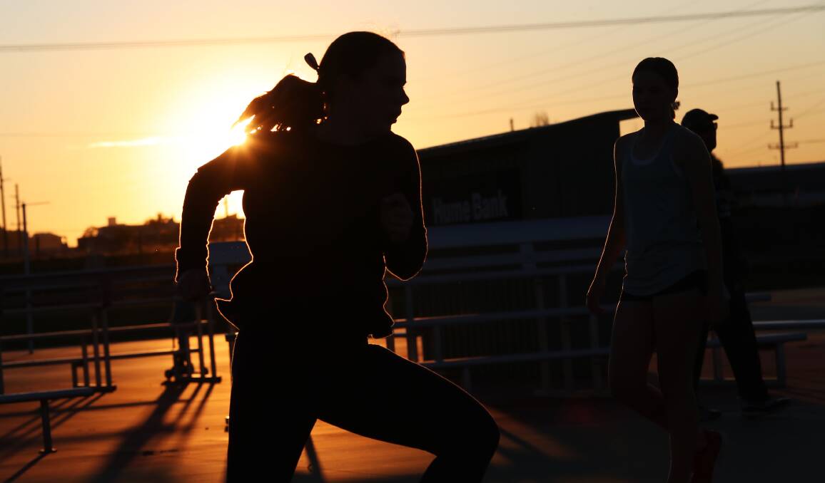 TRAINING RETURN: Elisa Cook, 14, gets in some training before the sun goes down at representative netball training on Monday. Picture: Emma Hillier