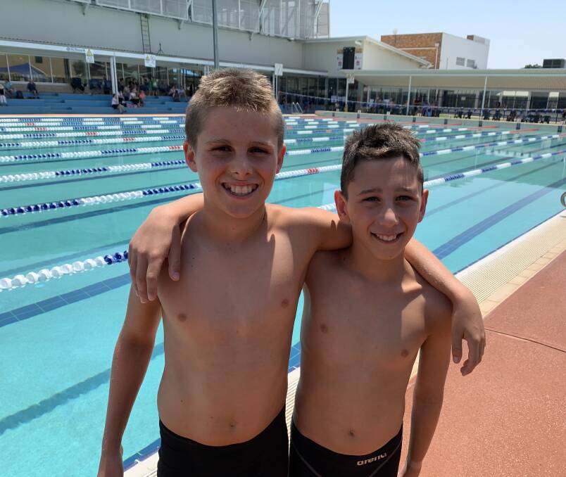 RECORD BREAKERS: Ben Devries and Tom Swann set new benchmarks at Mater Dei Primary School's swimming carnival on Tuesday. 