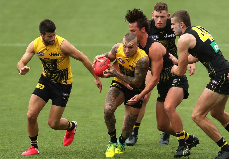 STARS COMING: Richmond guns Trent Cotchin (left) and Dustin Martin (with ball) at a Richmond training session. Picture: Getty Images