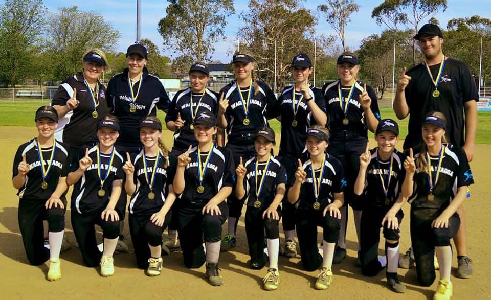 WINNERS ARE GRINNERS: The Wagga under-16 girls celebrate after taking out their division at the annual Australia Day weekend tournament in Canberra. 
