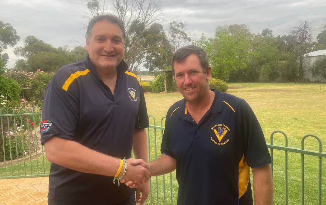 BACK ON BOARD: Shaun Brooker (left) is congratulated by Narrandera's head of recruitment Jamie Grintell after returning as Eagles coach. Picture: Narrandera Eagles