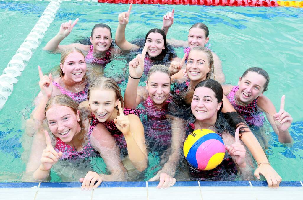 The Octopuses celebrate winning the women's first grade grand final at Oasis Aquatic Centre on Saturday. Picture: Les Smith