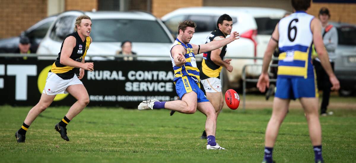 WAITING GAME: Jacob Smith gets a kick away during MCUE's loss to Wagga Tigers on Saturday. Picture: James Wiltshire/The Border Mail 