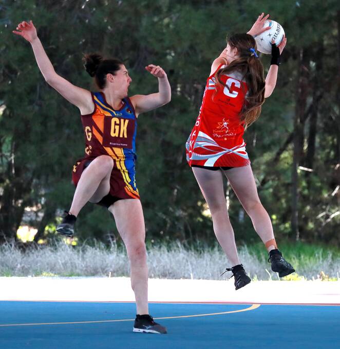 CLIFFHANGER: Ganmain-Grong Grong-Matong's Brooke Walsh and Collingullie-Glenfield Park's Olivia Harper vie for possession. Picture: Les Smith