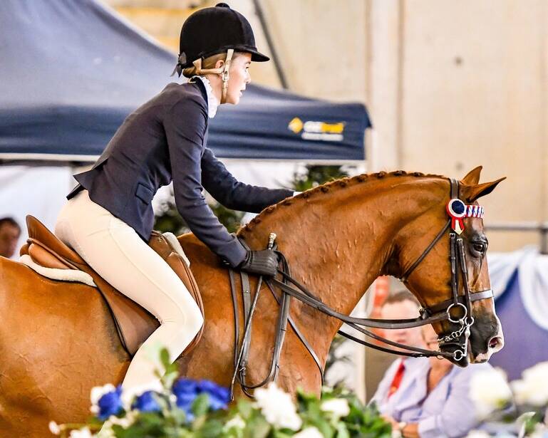 Gracie Goodyer on her way to winning best girl rider at the Sydney Royal Show.