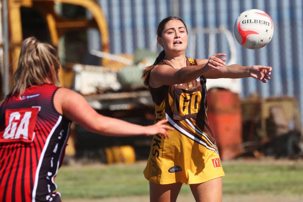 TOUGH LOSS: East Wagga Kooringal centre Brianna Cain fires off a pass during Saturday's loss at North Wagga. Picture: Emma Hillier
