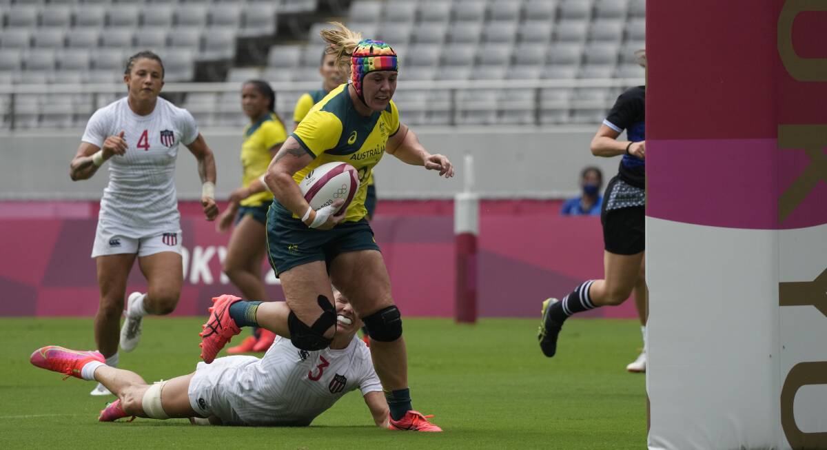 SHOCK LOSS: Batlow's Sharni Williams scored a try, but it wasn't enough to prevent USA upsetting Australia in Friday's rugby sevens pool match. Picture: AAP Images