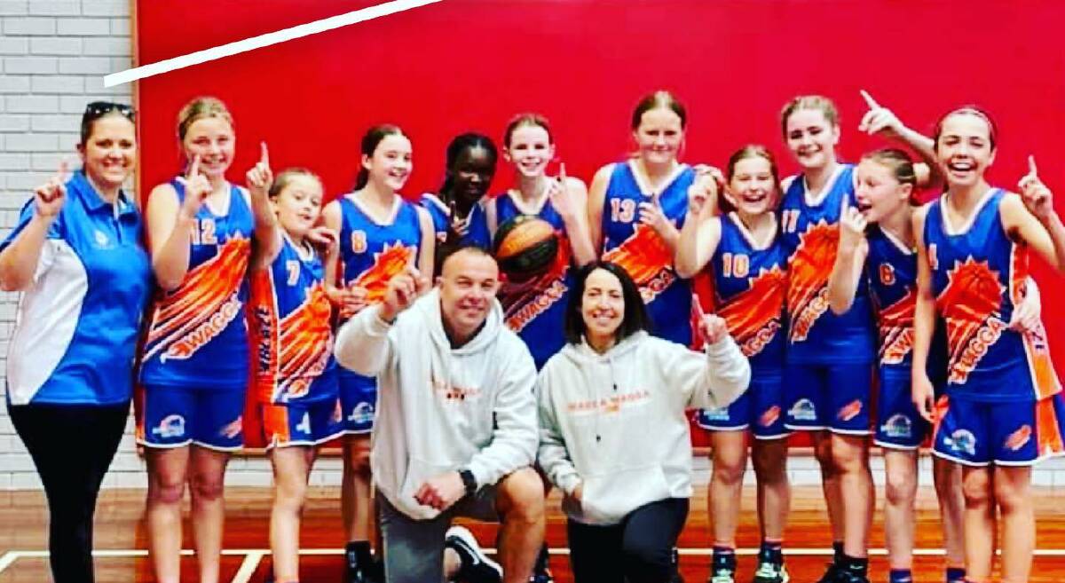VICTORIOUS: The under-14 Blaze came home from the Southern Junior League finals with the trophy. Picture: Basketball Wagga 