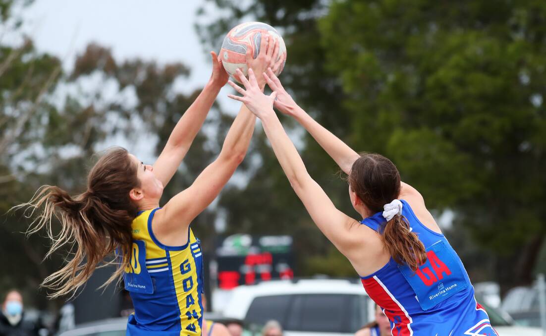 CHANGES: MCUE's Shannon Russell and Turvey Park's Sophie Hallam contest the ball during a game this year. 