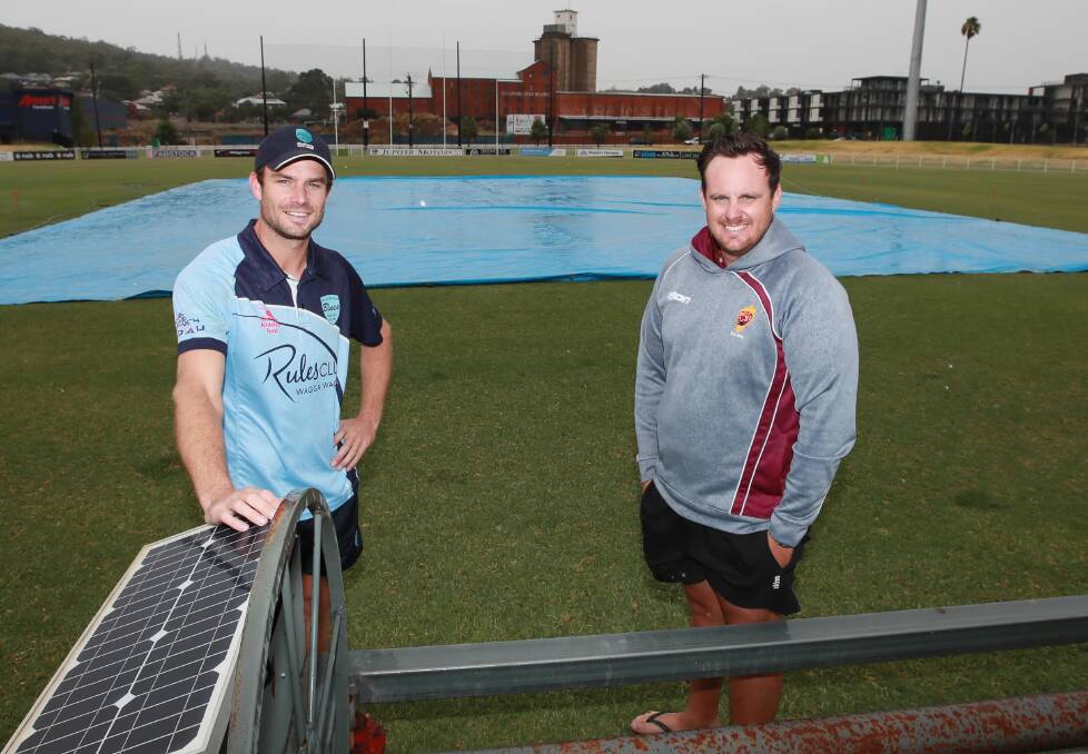 SLOW START: South Wagga skipper Luke Gerhard and St Michaels opposite Isaac Connor before a rain-affected game last season. Picture: Les Smith