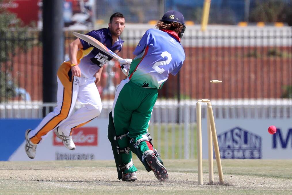 CALL UP: Wagga's Djali Bloomfield, pictured dismissing Murrumbidgeee batsman Dean Bennett when representing ACT Aces at Robertson Oval last year, has been named in the PM's XI. Picture: Les Smith