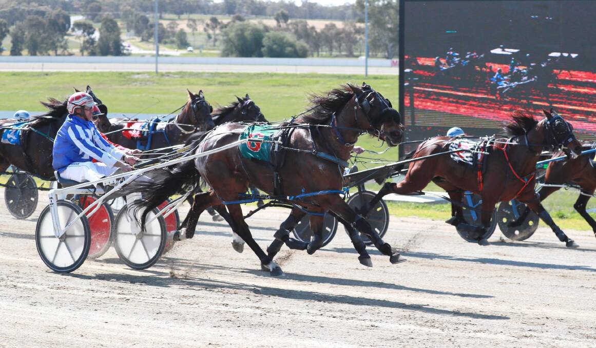 FLASHING HOME: Leon Hancock drives Good Time Nedra to a from-the-back win in the Supermix Concrete Pace (1740m) at Riverina Paceway on Friday. Picture: Les Smith
