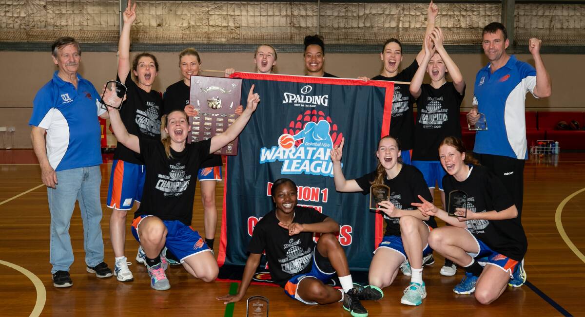 CHAMPIONS: Abbey Morton (front, second from right) celebrates with Wagga Blaze after their grand final win this month. Picture: Narelle Spangler