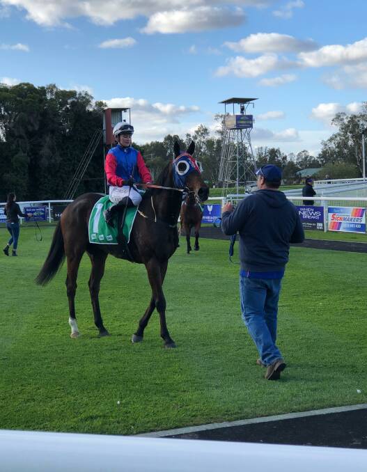 JOB DONE: Jockey Danielle Scott is congratulated after her win aboard Let's Get Animal on Sunday. Picture: Murrumbidgee Turf Club 