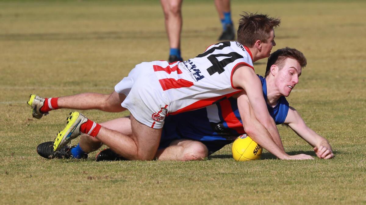 STILL KEEN: Turvey Park's Billy Glanville and CSU's Harry Wakefield grapple for the ball in Saturday's trial game. Picture: Les Smith
