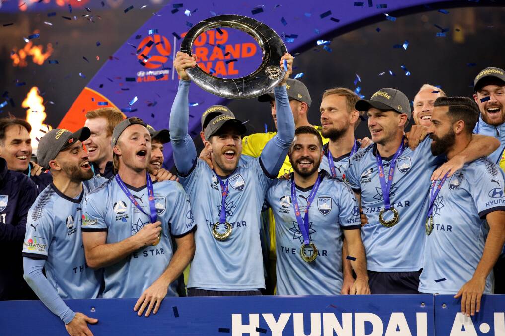 WAGGA BOUND?: Sydney FC players celebrate after beating Perth in this year's A-League grand final. Picture: AAP Image/Richard Wainwright.
