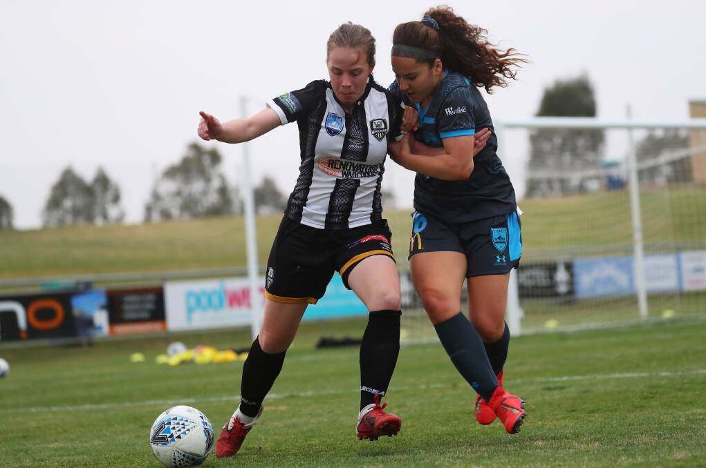 SCRATCH MATCH: Wagga City Wanderers' Kristen Prior and Sydney FC's Julia Vignes battle for the ball during Friday's training match at Equex Centre. Picture: Emma Hillier