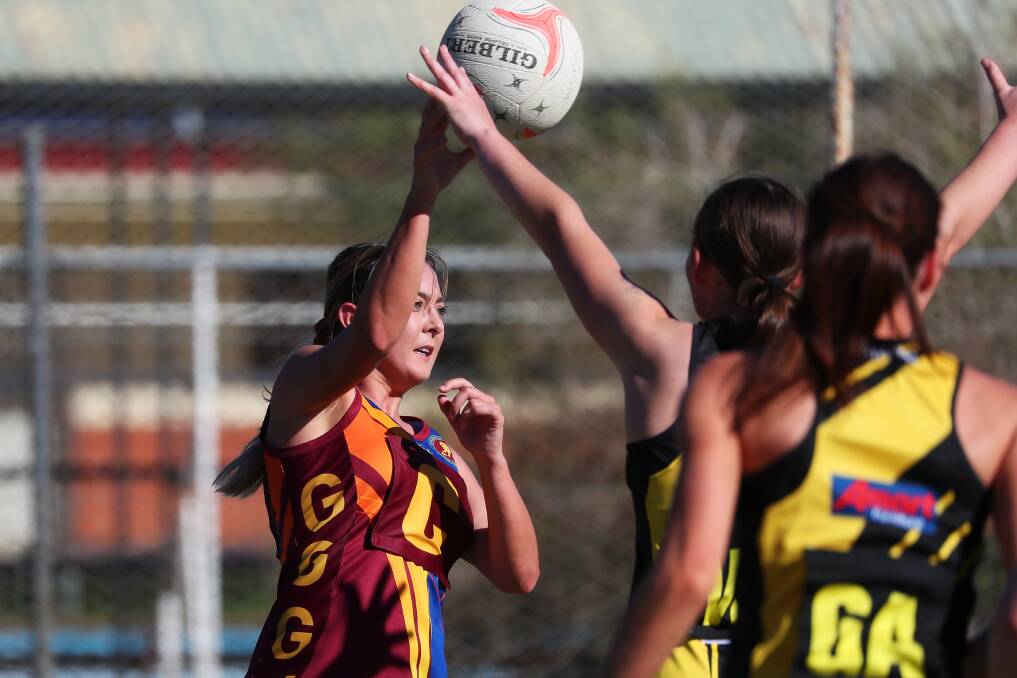 STEPPING UP: Chloe Hamblin, pictured playing netball for Ganmain-Grong Grong-Matong last year, is stepping up to the open division of this weekend's Ganmain Triathlon. Picture: Emma Hillier