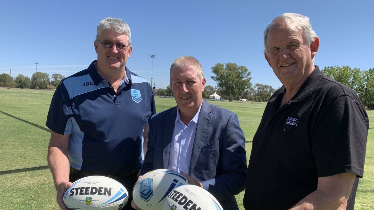 READY TO GO: NSW Touch vice president Chris Dolahenty, NSW Touch general manager Dean Russell and Wagga mayor Greg Conkey at Jubilee Park on Thursday. 
