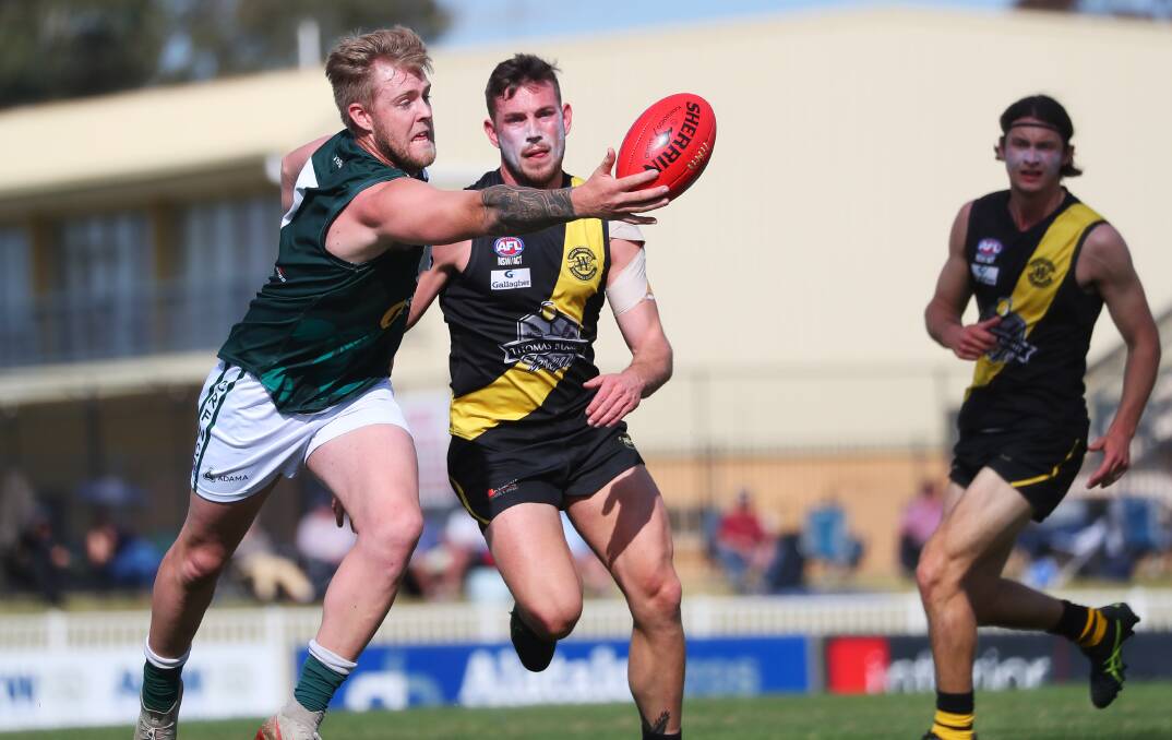 UNCERTAIN: Coolamon's Matthew McGowan competes for the ball during a game against Wagga Tigers last year. Picture: Emma Hillier