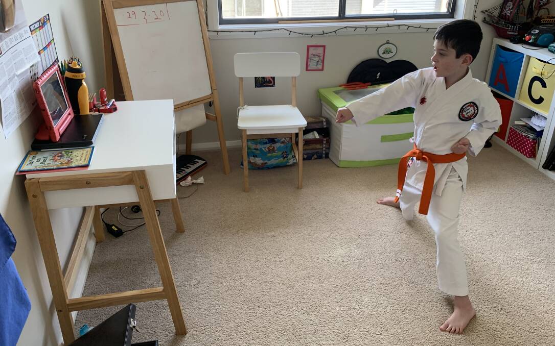 HOME TRAINING: Alex O'Keefe gets some mentoring online training with the Shinwa-Kai Karate Club. Picture: Contributed 