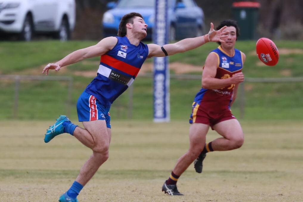 BIG LOSS: Turvey Park's Lachlan Leary strives to get a hold of the ball during Saturday's loss to Ganmain-Grong Grong-Matong. Picture: Les Smith