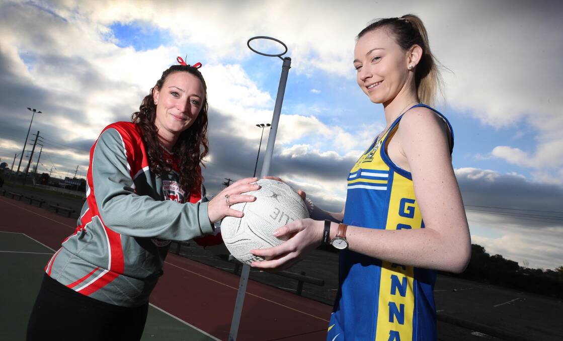 BEING VIGILANT: Collingullie-Glenfield Park's Jemima Norbury (left) poses with MCUE rival Katie Caller before she suffered a head knock during their match last month. Picture: Les Smith