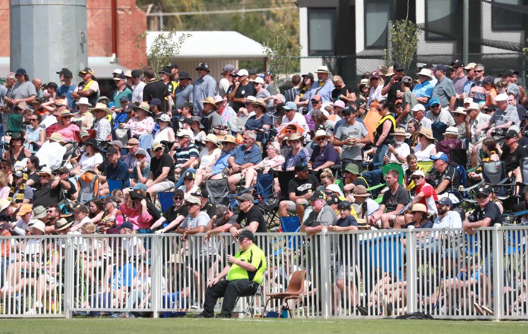 TUG OF WAR: Crowds packed out Robertson Oval for the Richmond-Greater Western Sydney pre-season game in March. Picture: Les Smith