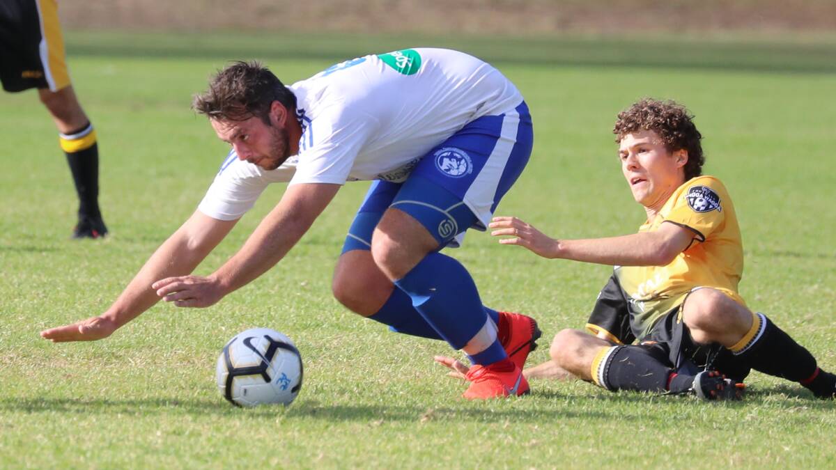 HAPPY RETURN: Tumut Eagles recruit Rhys Creed (right) attempts a challenge on Tolland's Aaron Moane in Tumut's 2-0 win at Rawlings Park on Sunday. 
