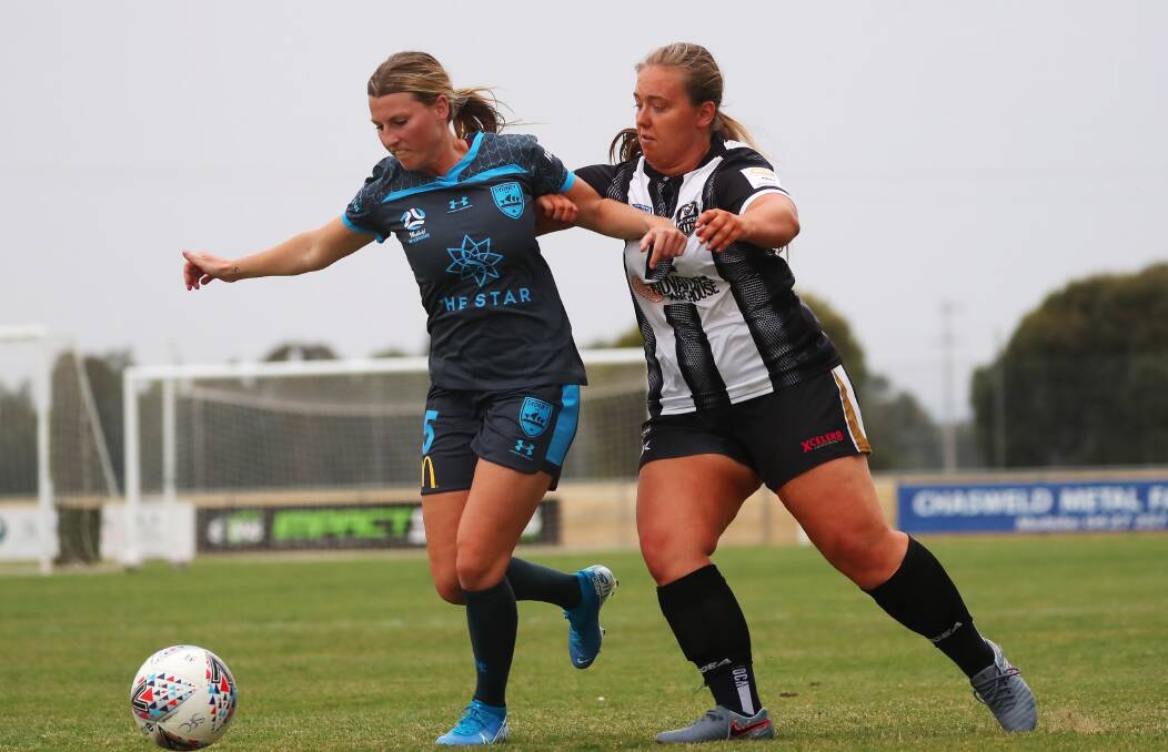 STANDOUT: Brooke Gayler (right) playing for Wagga City in a friendly against Sydney FC earlier this year. Picture: Emma Hillier