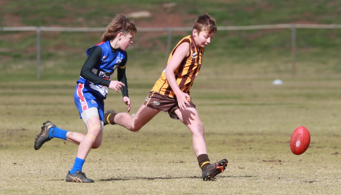 WAITING GAME: Turvey Park's Jack Stratton and East Wagga Kooringals' Kodi Flynn during an under-12s game earlier this season. Picture: Les Smith