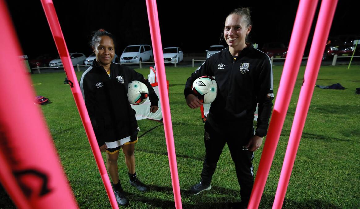 OPTIMISTIC: Miranda Walker (right) with Wagga City Wanderers skipper Suze Waia at training earlier this year. Picture: Les Smith