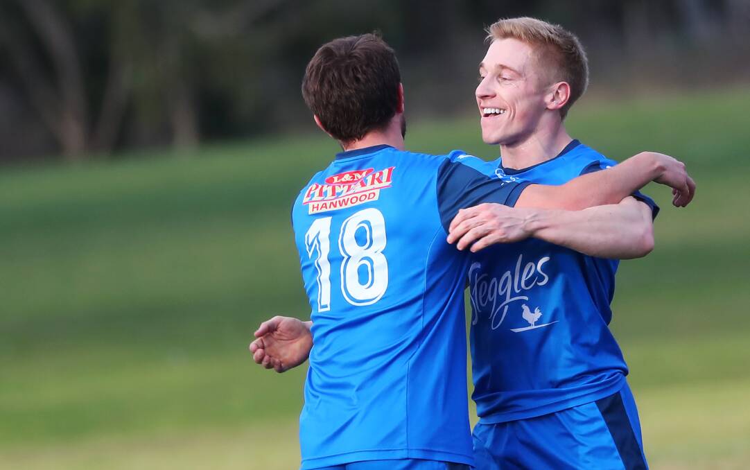 SEASON NEARS: Hanwood players Jordan Beltrame and Andy Gamble embrace after a goal last year. Picture: Emma Hillier
