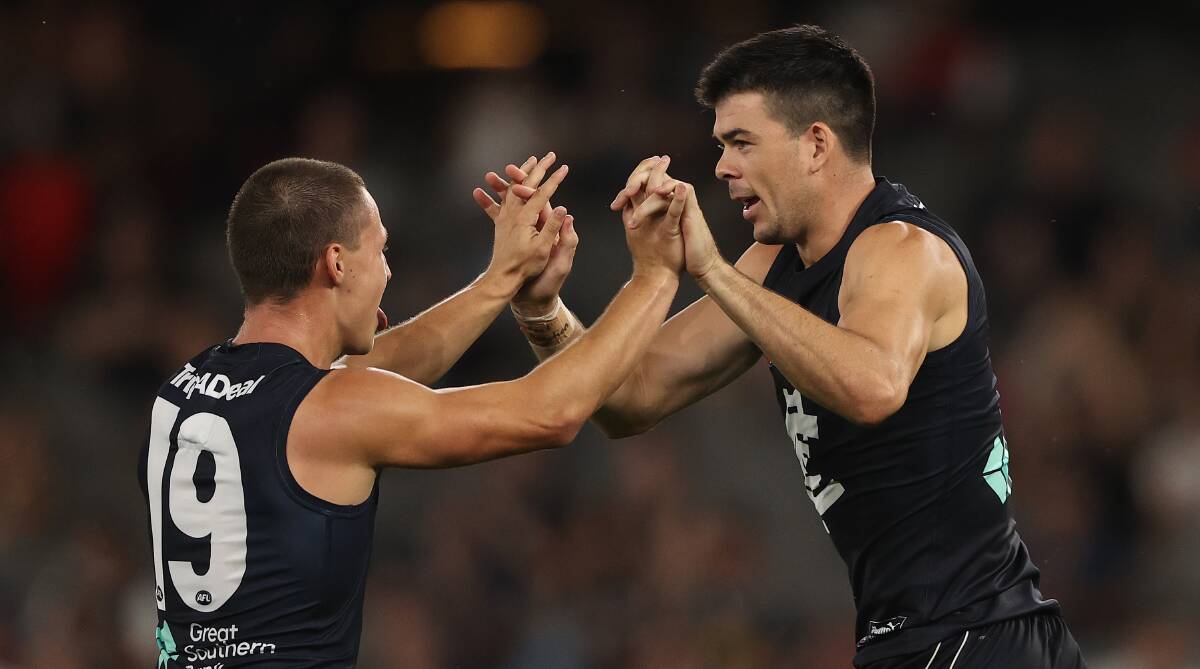 GOOD START: Collingullie product Matt Kennedy (right) celebrates a goal with teammate Corey Durdin during Carlton's pre season win over Melbourne on Thursday. Picture: Getty Images 