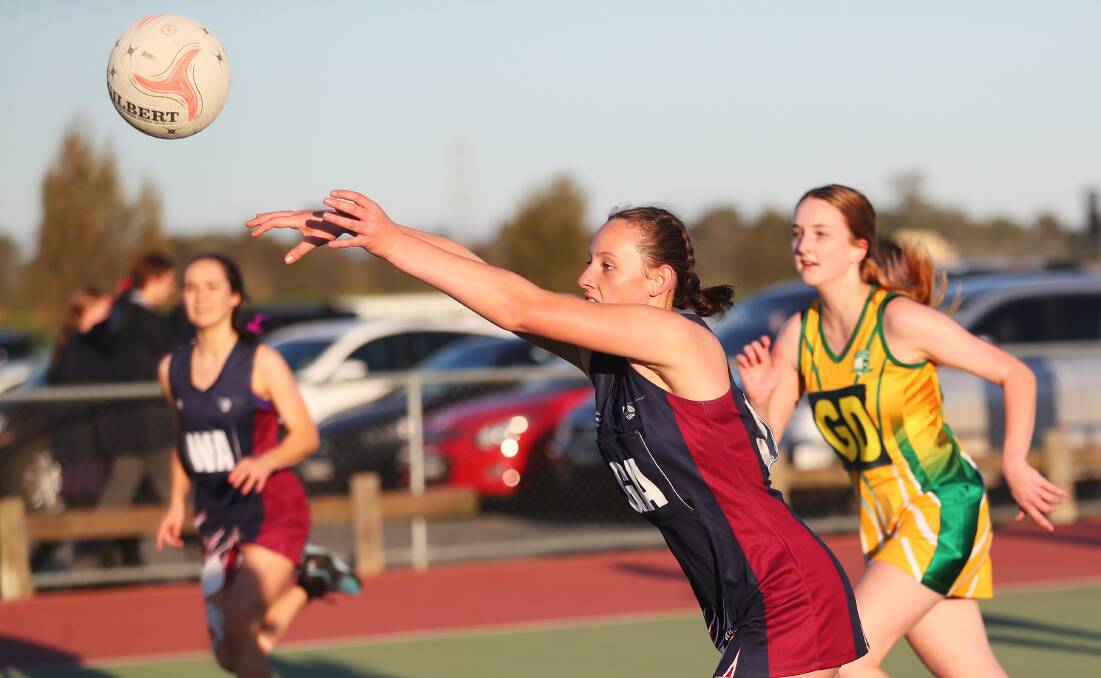 GOOD START: Wagga Wagga Christian College's Hayley Stevens passes the ball during her team's win over Mount Austin. Picture: Emma Hillier. 