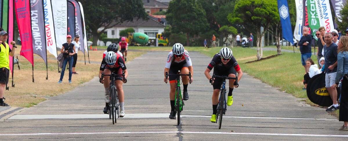 STRONG FINISH: Rebel Brooker finishes over the top of her rivals at the state criterium titles. Picture: Morgan Ho/St George Cycling Club