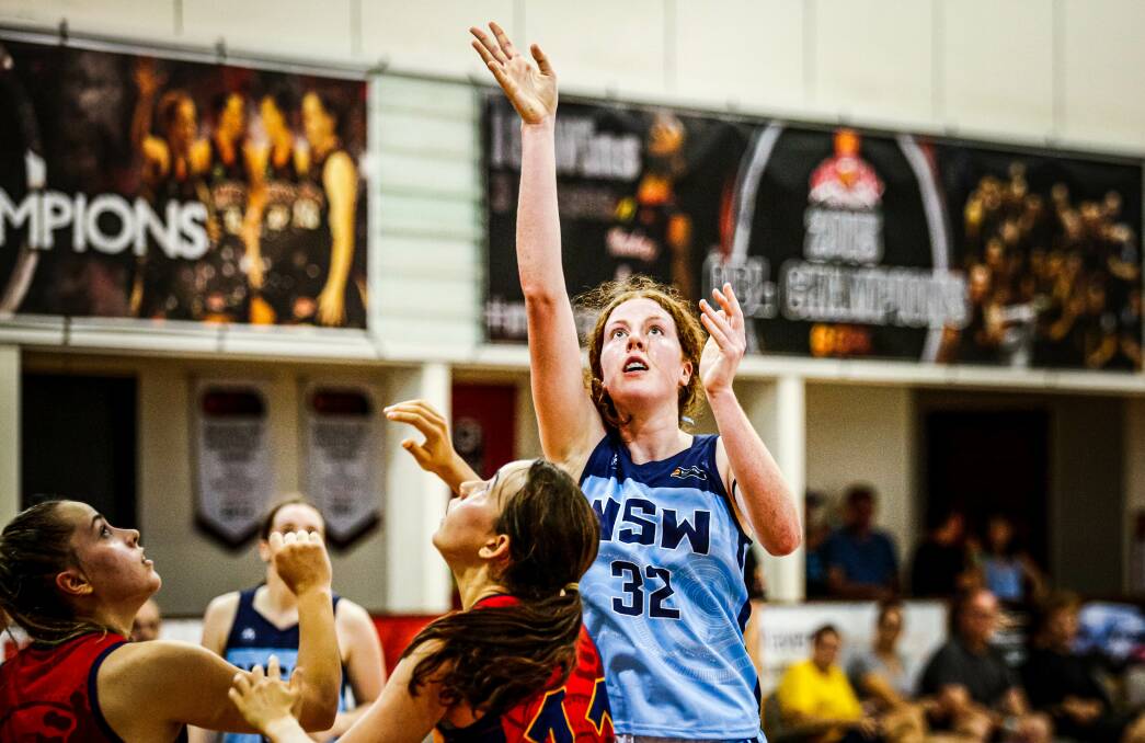 NATIONAL STAGE: Adelong's Amelia Hassett puts up a shot against South Australia in this week's Australian under-20 basketball championships in Mackay. Picture: Jarrod Potter/Basketball Victoria
