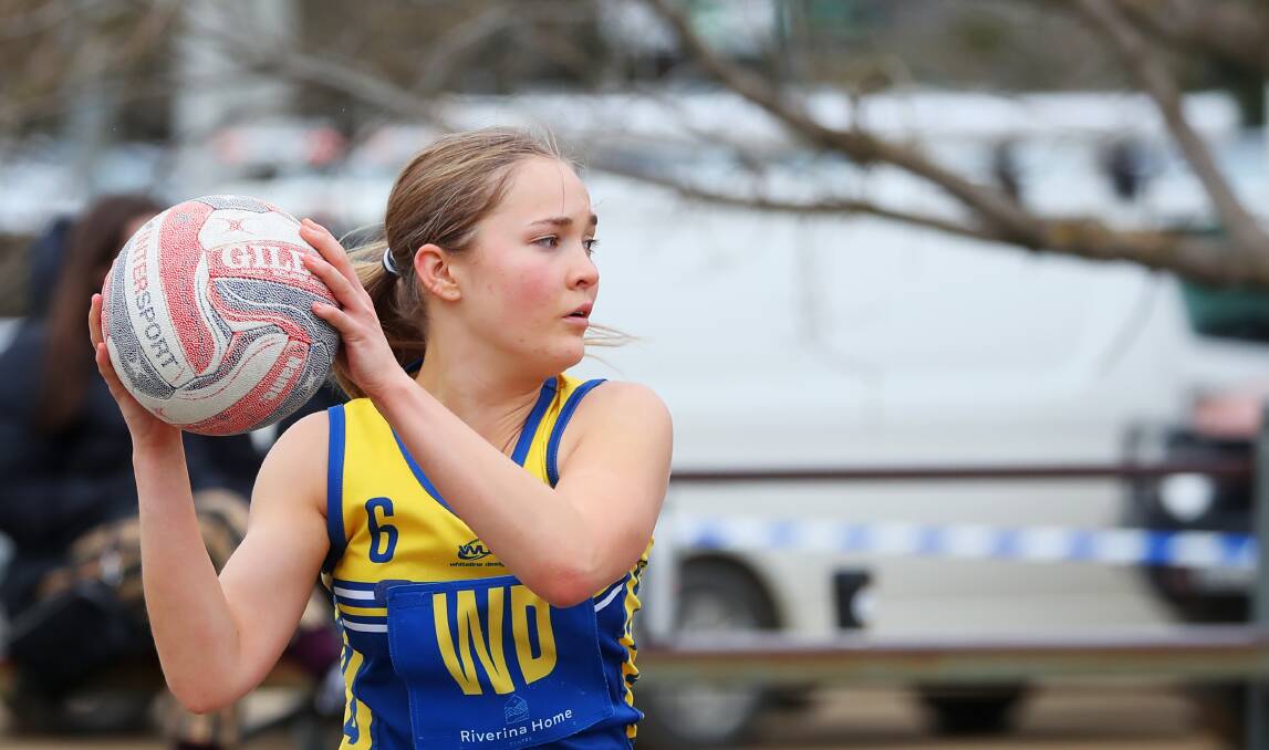 RIDING HIGH: MCUE's Claire Wallace looks for an option during the Goannas' minor premiership-winning season. Picture: Emma Hillier