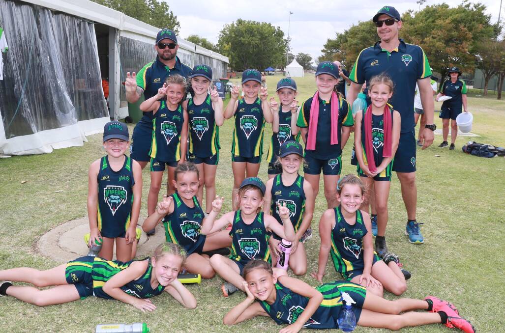 VICTORY: Wagga's under-eights girls celebrate after winning their final against Cronulls Sharks. Picture: Les Smith
