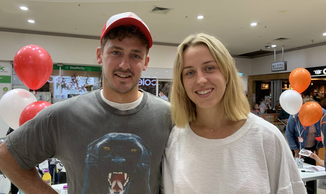 TALENTED COUPLE: GWS Giants footballer Harry Perryman and netballer Jamie-Lee Price in Wagga on Sunday. Picture: Jon Tuxworth