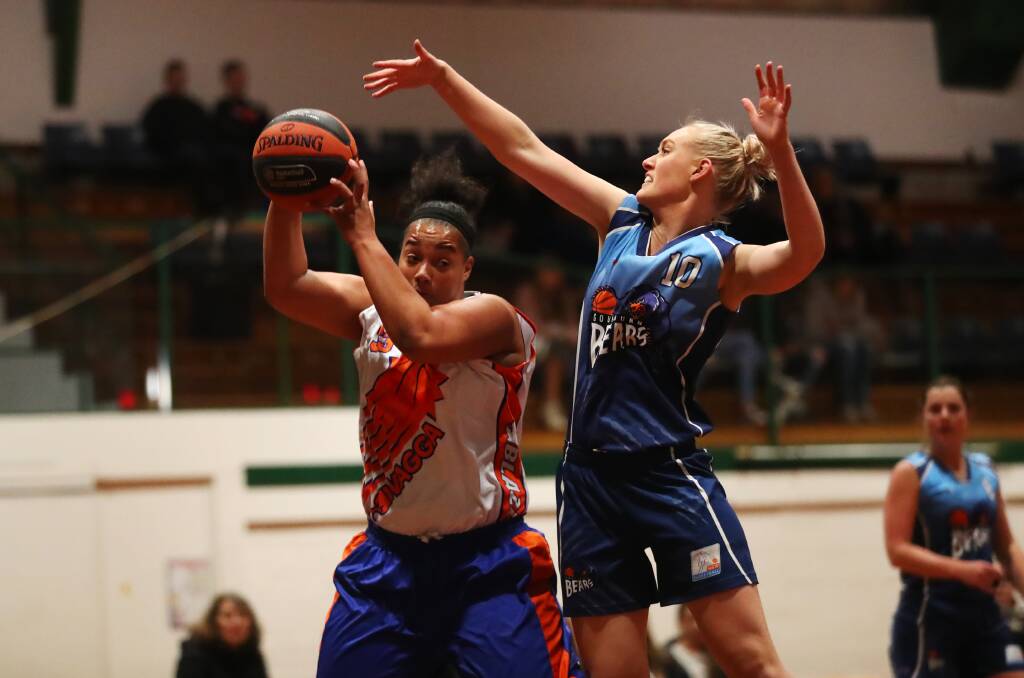 BIG GAME: Wagga import Khiani Clark is guarded by Goulburn's Naomi Lucas during the Blaze's overtime win on Sunday. Picture: Emma Hillier. 