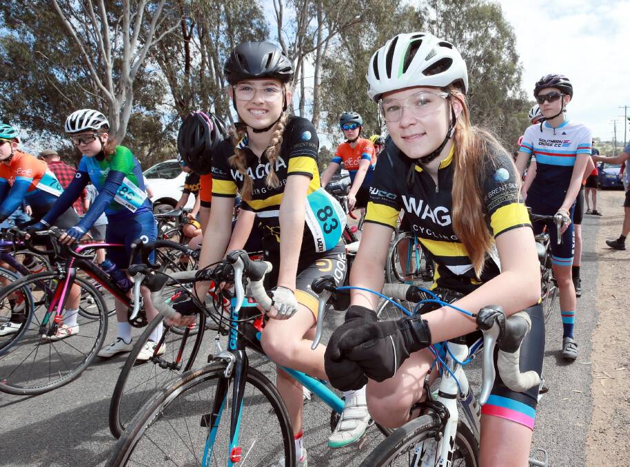 HOME COURSE: Wagga riders Georgia Thompson and Bethany Cattell at the start of the 15 years road race. Picture: Les Smith